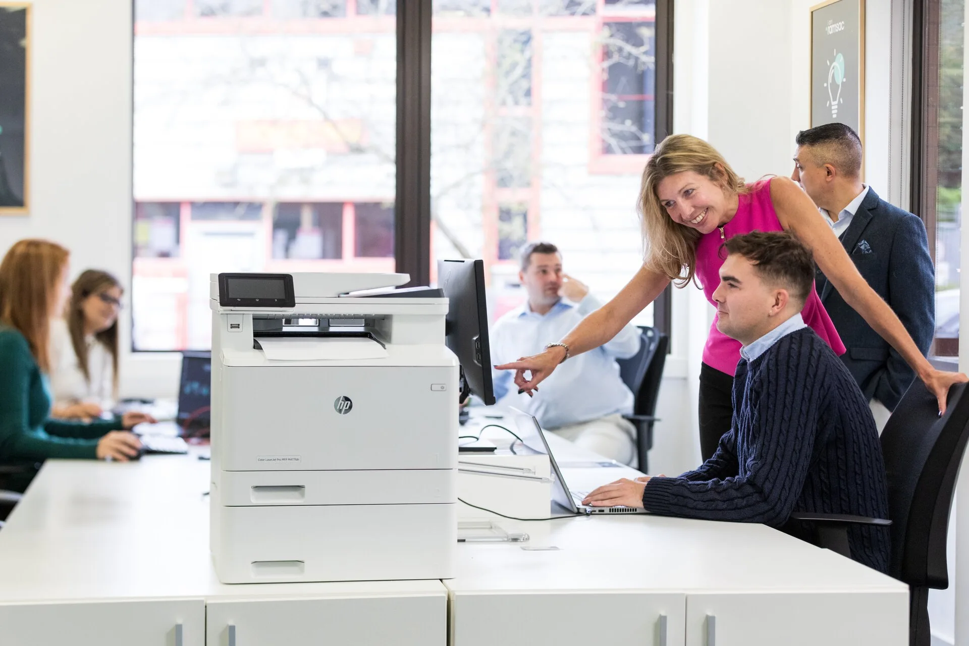 IT support lead Sally Cooper with her team