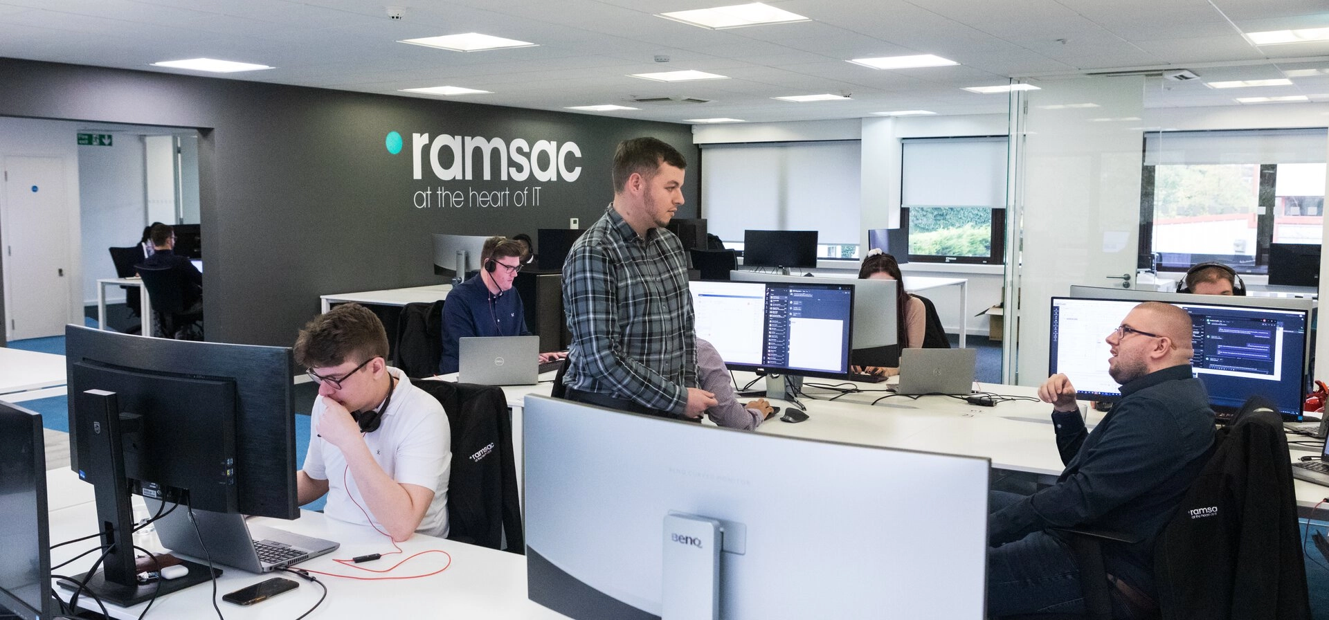 busy ramsac office with a variety of team members
