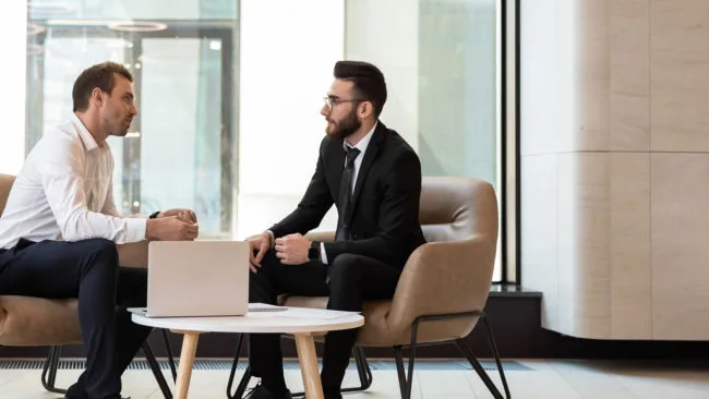 financiers at a meeting