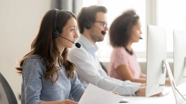 insurance help desk workers on phone