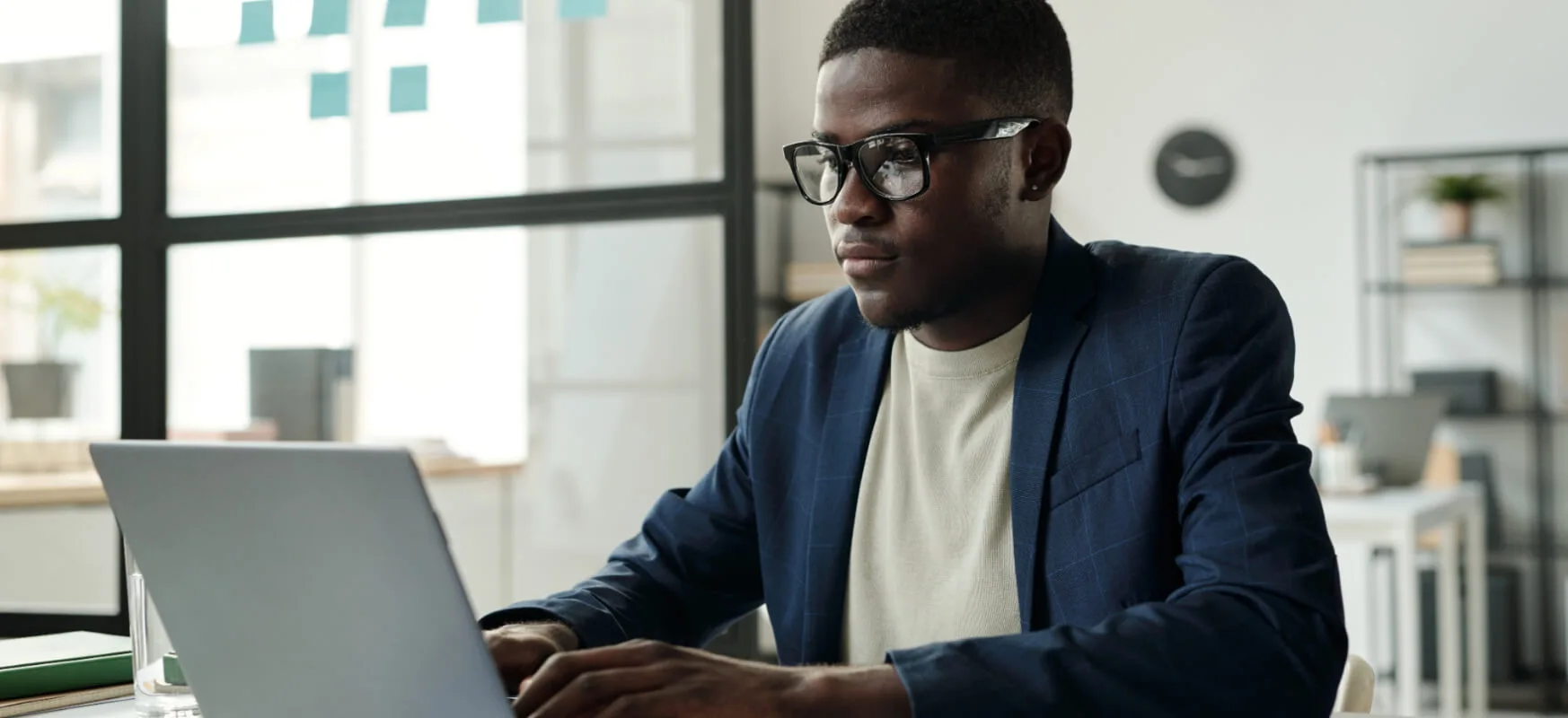 Person using a laptop as part of their job