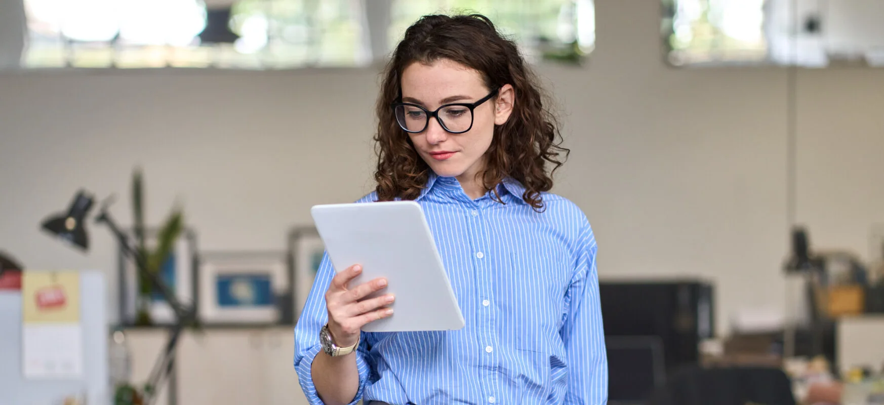 Person holding a tablet