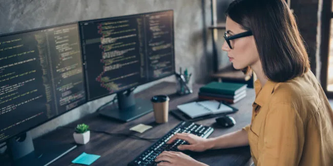 Professional coder using a computer