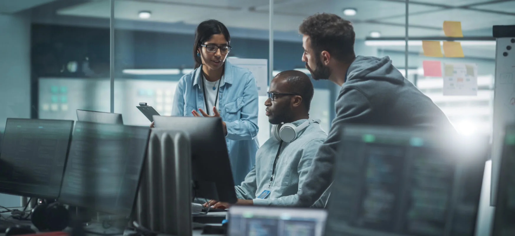 IT experts together in an office